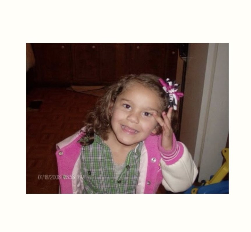 Alyssa as a young girl, whose grocery-store promise became LEV